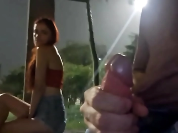 Sexy Brunette Teases And Pleasures Herself On Busy Street Corner